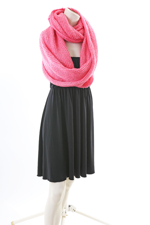 Big pink scarf pitcher on Headless Mannequin Cloth Display Dressmaker doll figurine. Fashion designer clothes.の写真素材