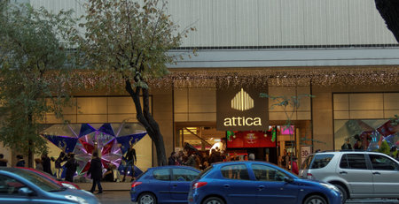 Thessaloniki, Greece Attica mall Christmas 2016 showcase. People at the decorated Christmas facade of Attica fashion center  at Tsimiski street Thessaloniki.のeditorial素材