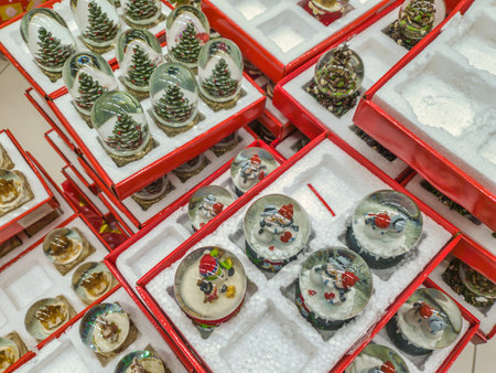 Christmas Themed presents on the shelves of toy store. Festive gift items with various prices, at fixtures of Jumbo Hellenic stores.のeditorial素材