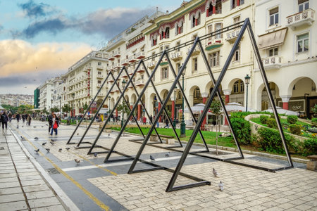 Thessaloniki, Greece Christmas preparations at Aristotelous square in the city center. Municipality crew working on installing festive houses, trees and decorations at main square.のeditorial素材