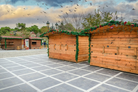 Thessaloniki, Greece Christmas preparations at Aristotelous square in the city center. Municipality crew working on installing festive houses, trees and decorations at main square.のeditorial素材