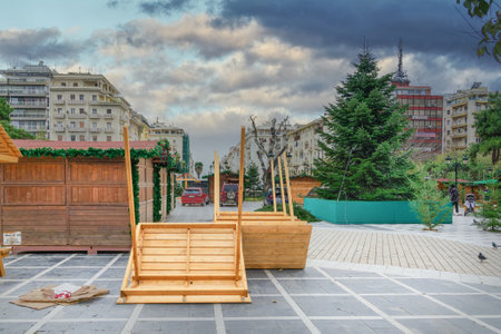 Thessaloniki, Greece Christmas preparations at Aristotelous square in the city center. Municipality crew working on installing festive houses, trees and decorations at main square.のeditorial素材