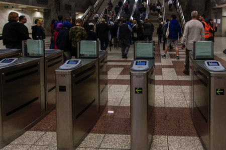 Athens, Greece Passengers on metro station with ticket validating TVC gates. Attiko Metro...