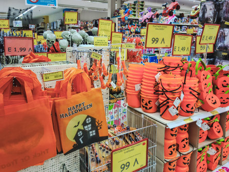 Thessaloniki, Greece - October 27 2020: Halloween supermarket products on shelf. Festive decorations including pumpkin mock-ups, on display for sale inside shop gallery.のeditorial素材