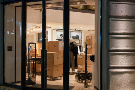 Thessaloniki, Greece - December 13 2020: Zara brand shipment boxes behind closed doors facade....
