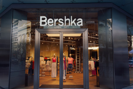 Thessaloniki, Greece - March 13 2021: Bershka retailer store exterior with logo. Spanish clothes & accessories brand owned by Inditex, trading worldwide store view with clothing at Tsimiski street.のeditorial素材