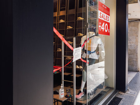 Thessaloniki, Greece - April 12 2021: Click and Collect open store entrance without customers. Window showcase of shop selling with a click away option due to covid-19 precaution measures.のeditorial素材