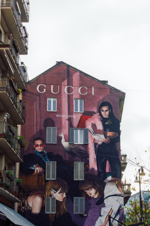 Milan, Italy - November 17 2021: Colorful wall graffiti by Gucci fashion brand. Vibrant street art mural depicting Eurovision winners band Maneskin, part of the Gucci Aria collection campaign.のeditorial素材