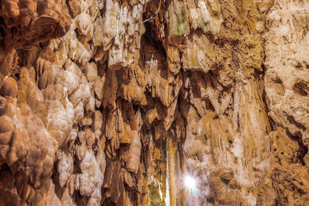 Limestone stalactites mineral formation hanging from the ceiling inside a cave in Edessa, Greece.の写真素材