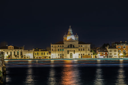 Venice Italy night view of Giudecca island with illuminated Le Zitelle Roman Catholic church, Santa Maria della Presentazione.の写真素材