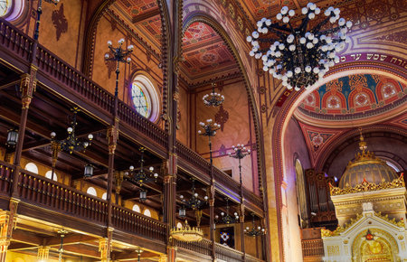Budapest, Hungary low angle interior view of illuminated Dohany Street Synagogue, Dohany utcai Zsinagoga.の写真素材