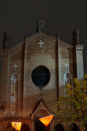 Bologna, Italy low angle view of Basilica of San Giacomo Maggiore facade at night.の写真素材