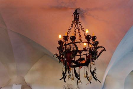 Bran, Romania - November 01, 2023: Bran Dracula Castle Transylvania spooky Halloween hanging chandelier with mysterious pagan decoration concept.のeditorial素材