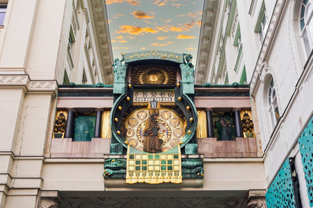 Vienna, Austria - April 14 2019: Low angle view of large Art Nouveau Anker Clock - Ankeruhr -...