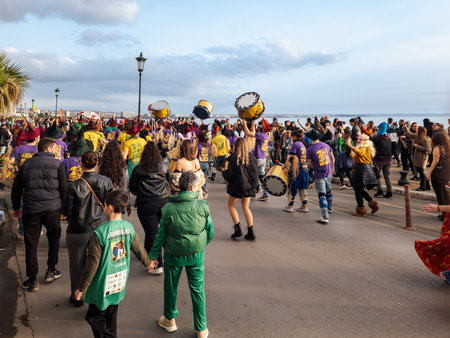 Thessaloniki, Greece - March 10 2024: carnival parade participants in costumes. Teams on the city streets marching with drums dressed in various thematic outfits.のeditorial素材