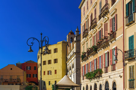 Cagliari historic colorful buildings facade with wooden window shutters at Santa Croce Bastion observation area in Sardinia Island, Italy.の写真素材