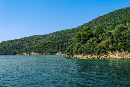 Sea view of coastline with vivid green plantation in Lefkada Ionian Island Greece.の写真素材