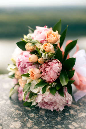 Wedding bouquet from pink pions and rosesの写真素材