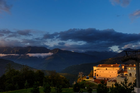 The resort complex at sunset on a background of mountains.の写真素材