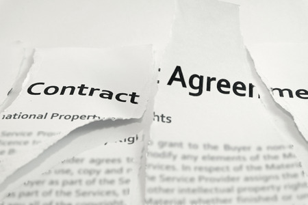 The contract was torn to pieces Using Source sans pro font which anyone can use them on commercial projectの写真素材