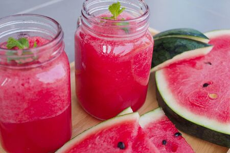 Cold watermelon juice and sliced watermelonの写真素材