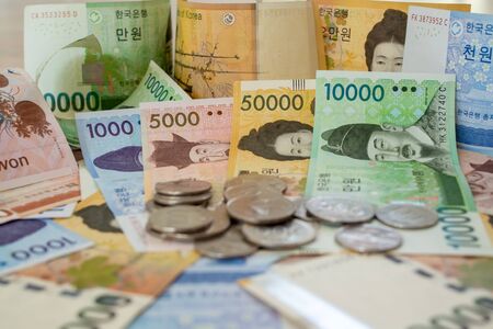 Korean banknotes and coins close upの写真素材
