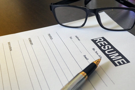Fill out a resume For the job.  Applying for a new job or being unemployed concept.