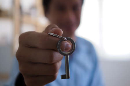 Men use smart phones to pay for bills through applications.の写真素材