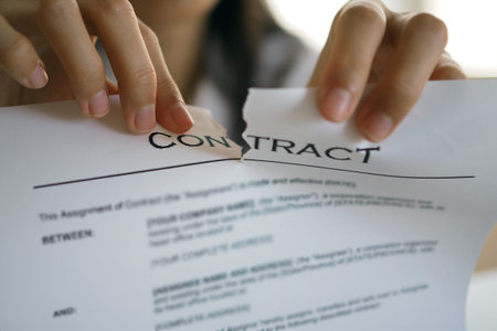 Businessmen are tearing documents, contracts or agreements that have direct legal consequences....