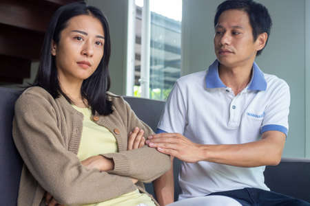 The wife cried after knowing that her husband was unfaithful. love problemの写真素材