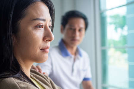 The wife cried after knowing that her husband was unfaithful. love problemの写真素材