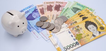 Korean won notes and Korean won coins for money concept backgroundの写真素材