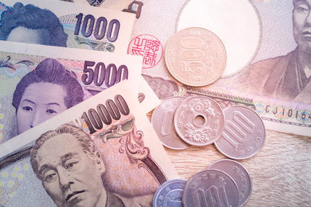 Japanese yen notes and Japanese yen coins close up