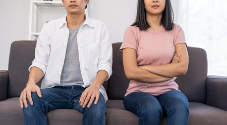 Couples are bored, stressed, upset and irritated after quarreling. Family crisis and relationship problems that come to an endの写真素材