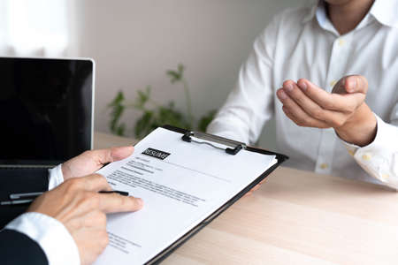 Resume concept. Executives or interview manager candidates. Talk about your past work experience and talents in the position.の写真素材