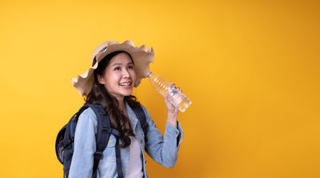 Nice looking Asian female traveler with suitcase and hats to travel during the holidays. backpacker...
