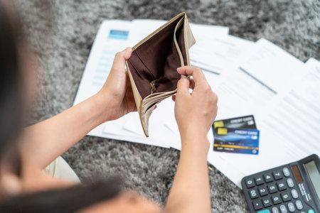 Men headaches and stress over large bills or invoice and credit card debt. money shortage,on money...