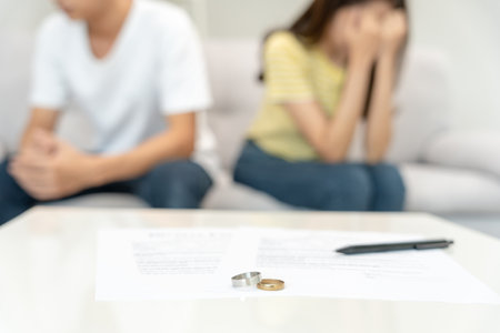 Quarrel, Divorce. husband and wife remove married ring. Couples desperate and disappoint after marriage. Divorce document, upset and frustrated after conflict. distrust, love problems, betrayalsの写真素材