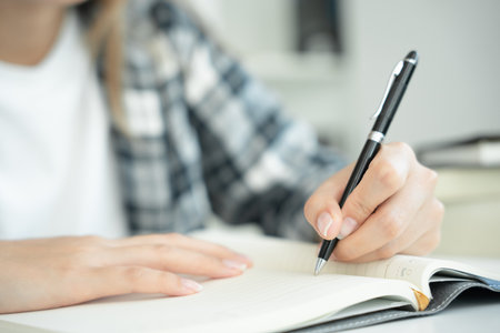 Student, use left-handed, inspiration, writer, writing ,creative ,recreation for imagine, writing ideas on notebook, to do list, good thinking work, journalist, Stylish, Dream image, relax, designerの写真素材