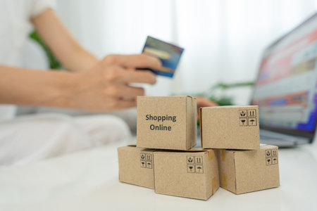 woman using computer for online shopping at home. stay home, technology, electronic commerce, internet, market place, final or summer or big sale, payment, discount for credit, offer, Low priceの写真素材