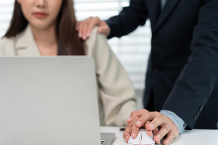 businessman sexually harassed a female colleague by touch her shoulder. Sexual harassment in office....