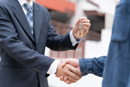 lease, rental and selling home. Dealership manager smile handshake to the new homeowner.  rent house, Sales, loan credit financial, insurance, Seller, dealer, installmentの写真素材