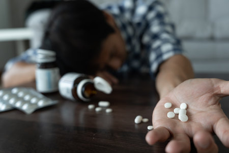 asian man use pills overdose, stressed, sad, drug abuser, drug addict, sick, unhealthy, unhappy, suicide, depressed or hopeless, Anti drug, drug addict, life and family problems, unmotivatedの写真素材