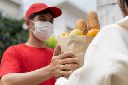 Delivery man send deliver express. online shop, paper container, takeaway, postman, delivery service, packages, electronic money, Digital paper bag, bag, customer, logistic, e-commerce, shoppingの写真素材