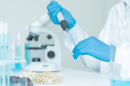 Scientist check chemical whole grains residues in laboratory. Control experts inspect the concentration of chemical residues. hazards, standard, prohibited substances, contaminate, Microbiologistの写真素材