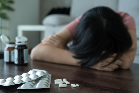 asian woman use pills overdose, stressed, sad, drug abuser, drug addict, sick, unhealthy, unhappy, suicide, depressed or hopeless, Anti drug, drug addict, life and family problems, unmotivatedの写真素材