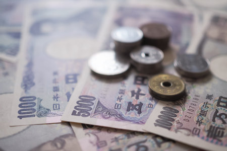 Japanese Yen money. close up of the Japanese yen on hand. currency of Japan that is used to change,...