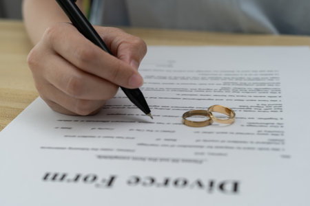 Quarrel, Divorce. husband and wife remove married ring. Couples desperate and disappoint after marriage. Divorce document, upset and frustrated after conflict. distrust, love problems, betrayalsの写真素材