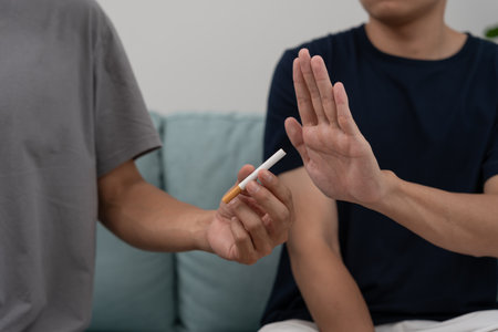 No smoking. Man stop smoke, refuse, reject, break take cigarette, say no. quit smoking for health. world tobacco day. drugs, Lung Cancer, emphysema , Pulmonary disease, narcotic, nicotine effectの写真素材