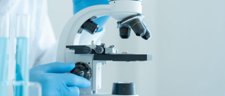 Scientist analyze biochemical samples in advanced scientific laboratory. Medical professional use...